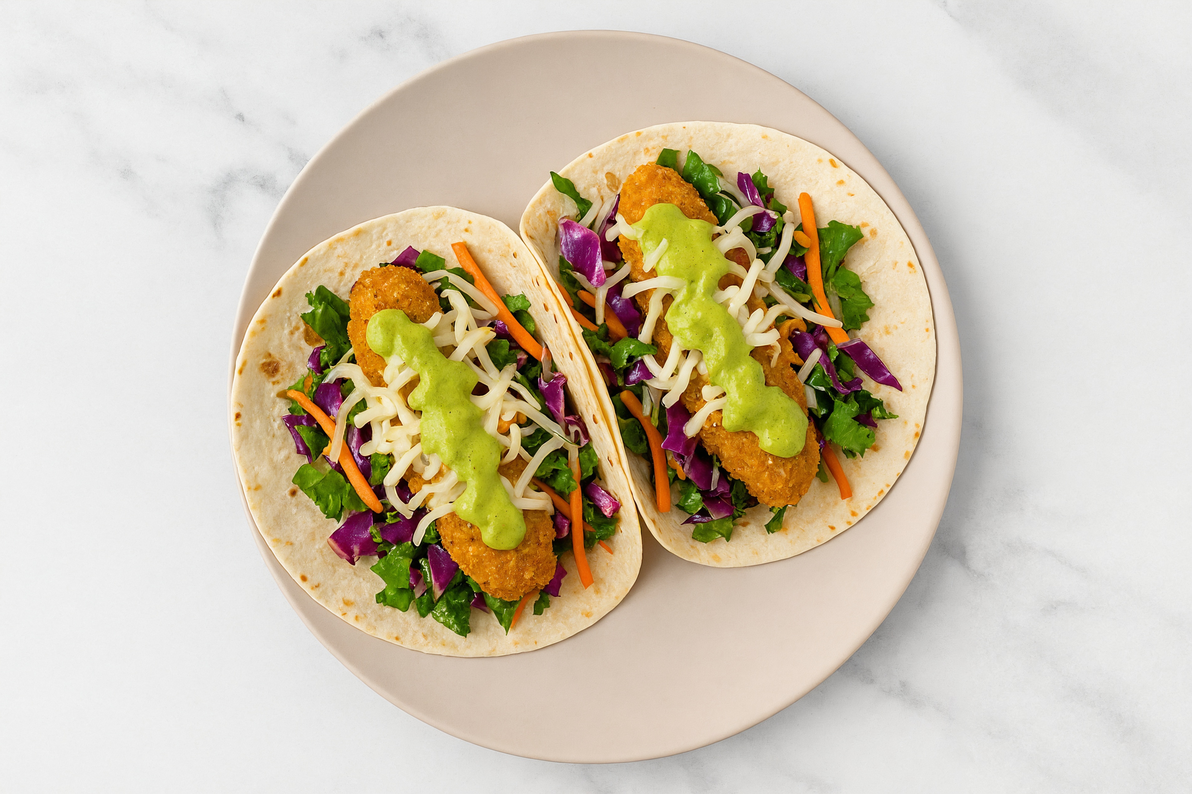 Cheesy Chick'n Tenders Tacos with Avocado + Rainbow Veggie
