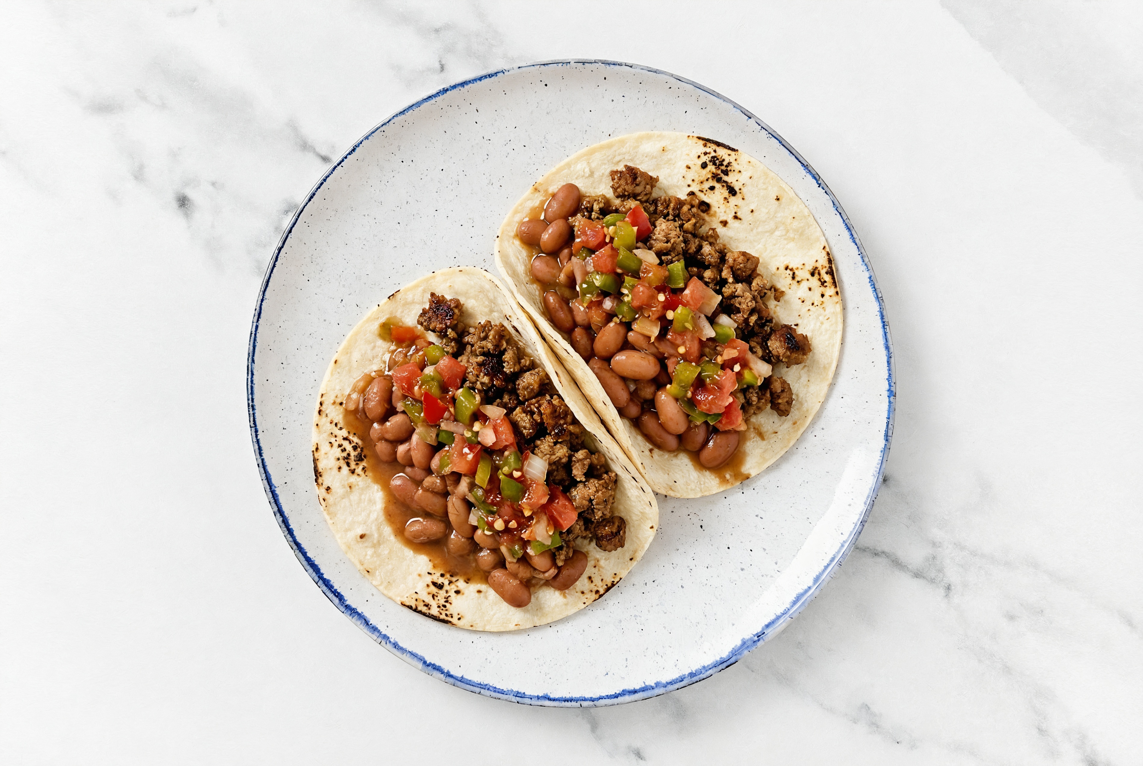 Hearty Mexican-Style Ground Beef Tacos with Pico De Gallo & Pinto Beans