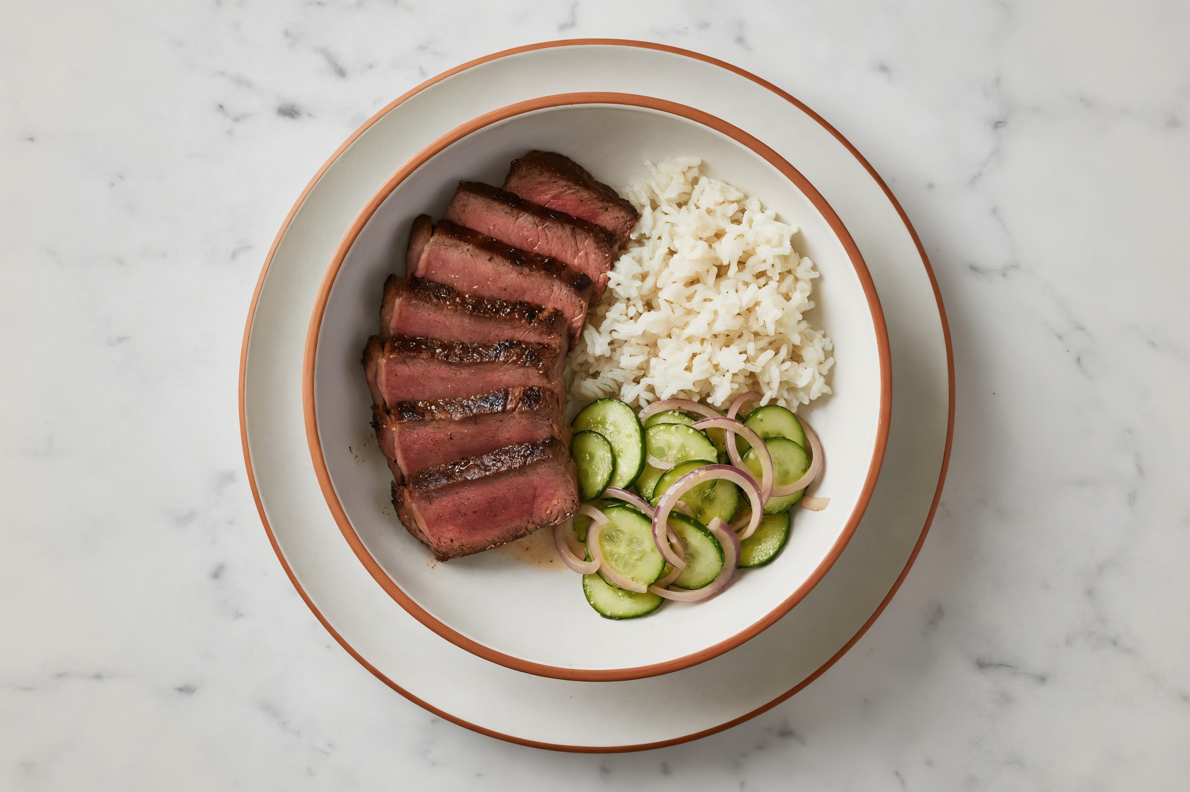 Grass-Fed Beef Sirloin Steaks + Rice, Pesto Aioli, Cucumber + Red Onion