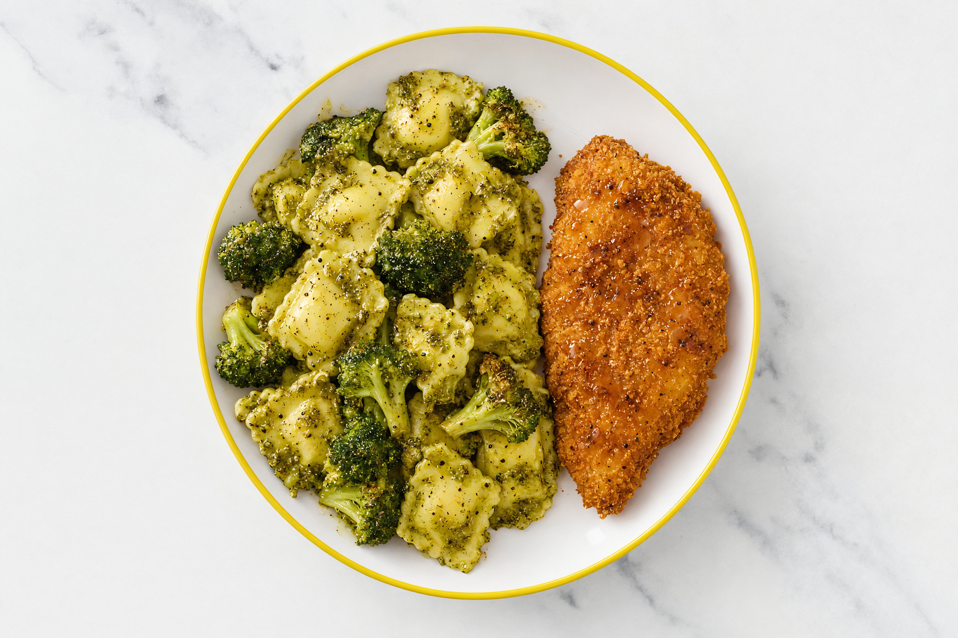 Crispy Hot Honey Chicken over Pesto Ravioli with Broccoli