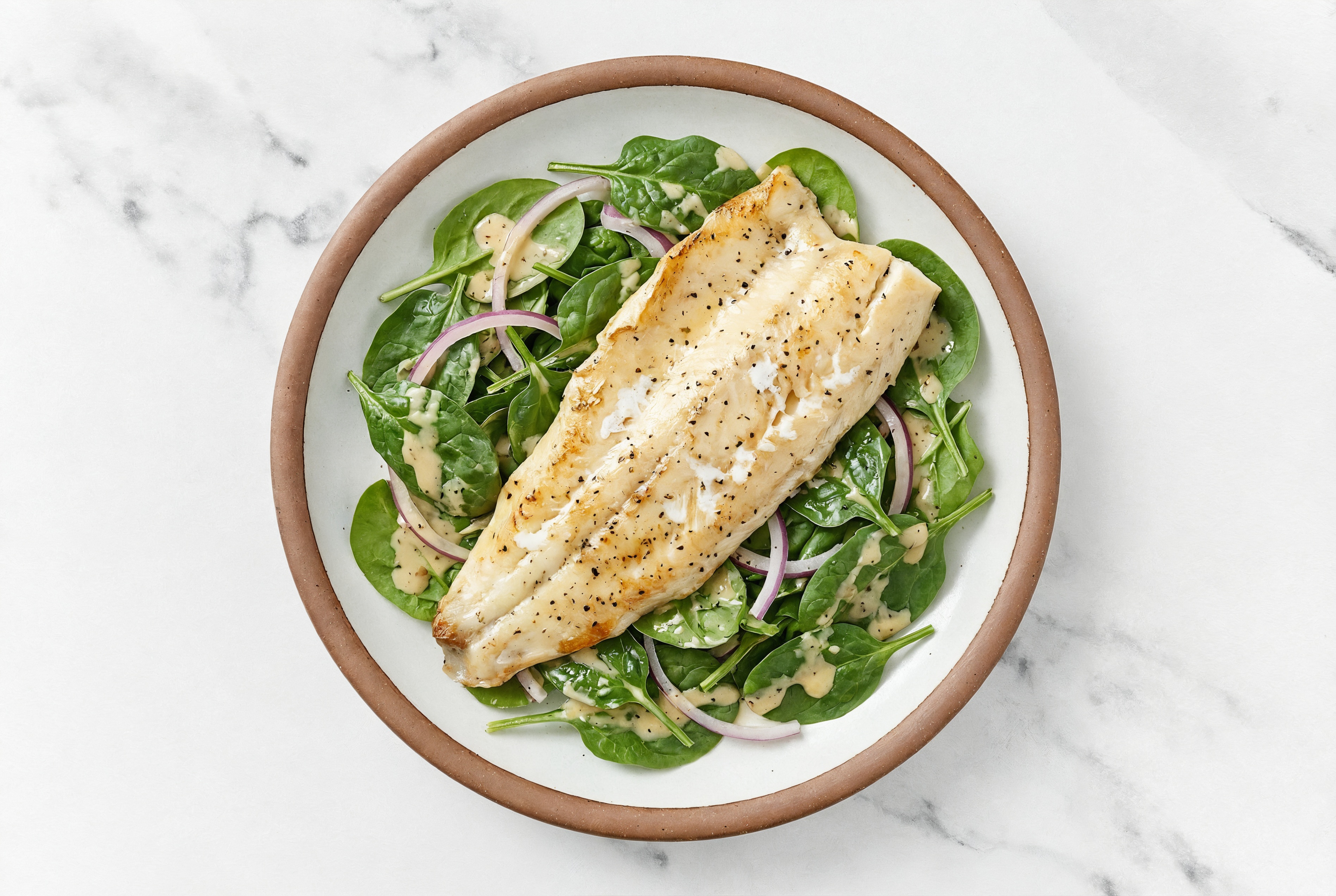 Baby Spinach Salad with Trout, Onion & Creamy Caesar Dressing