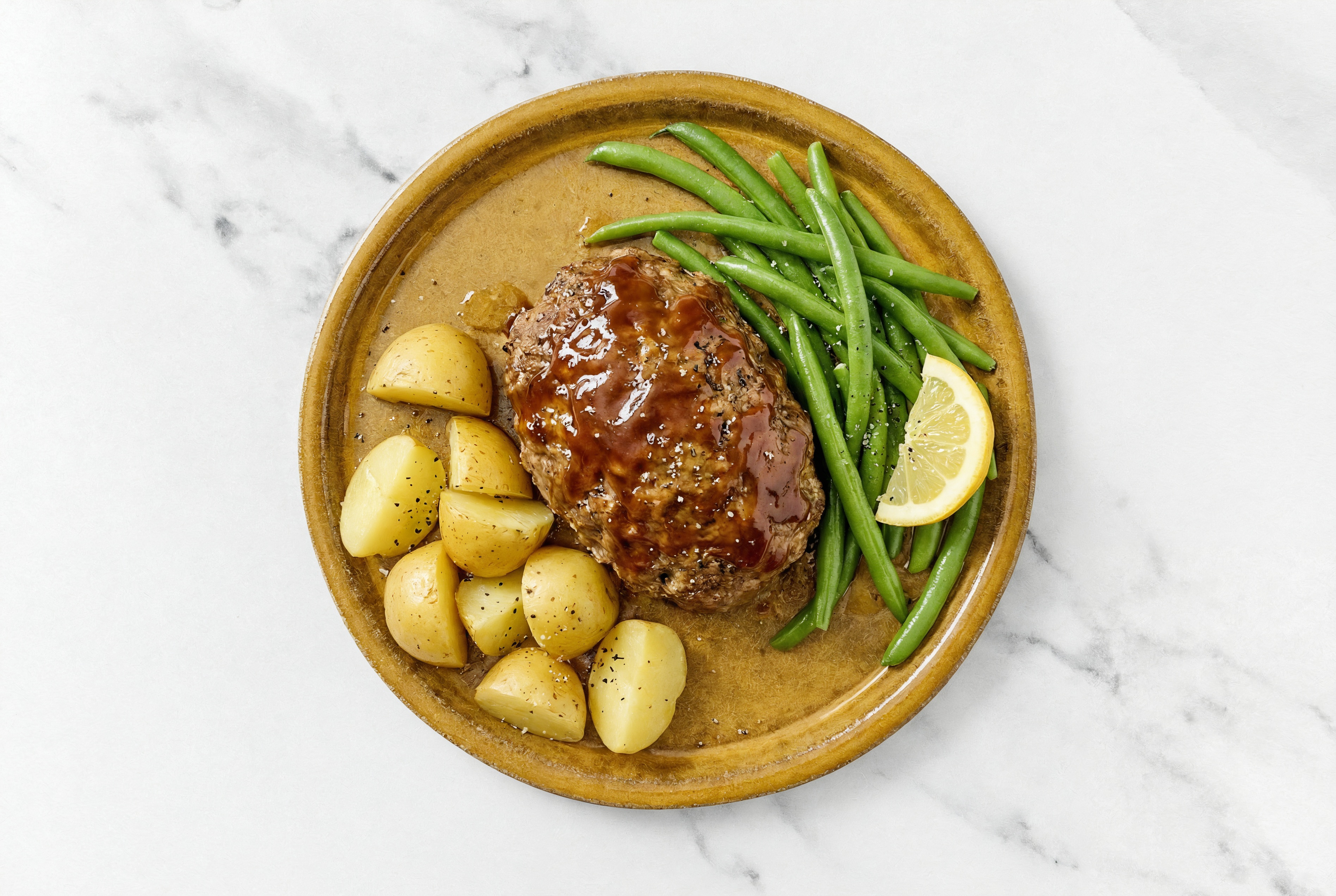 Mini BBQ Meatloafs with Roasted Yellow Potatoes, Green Beans, and Lemon