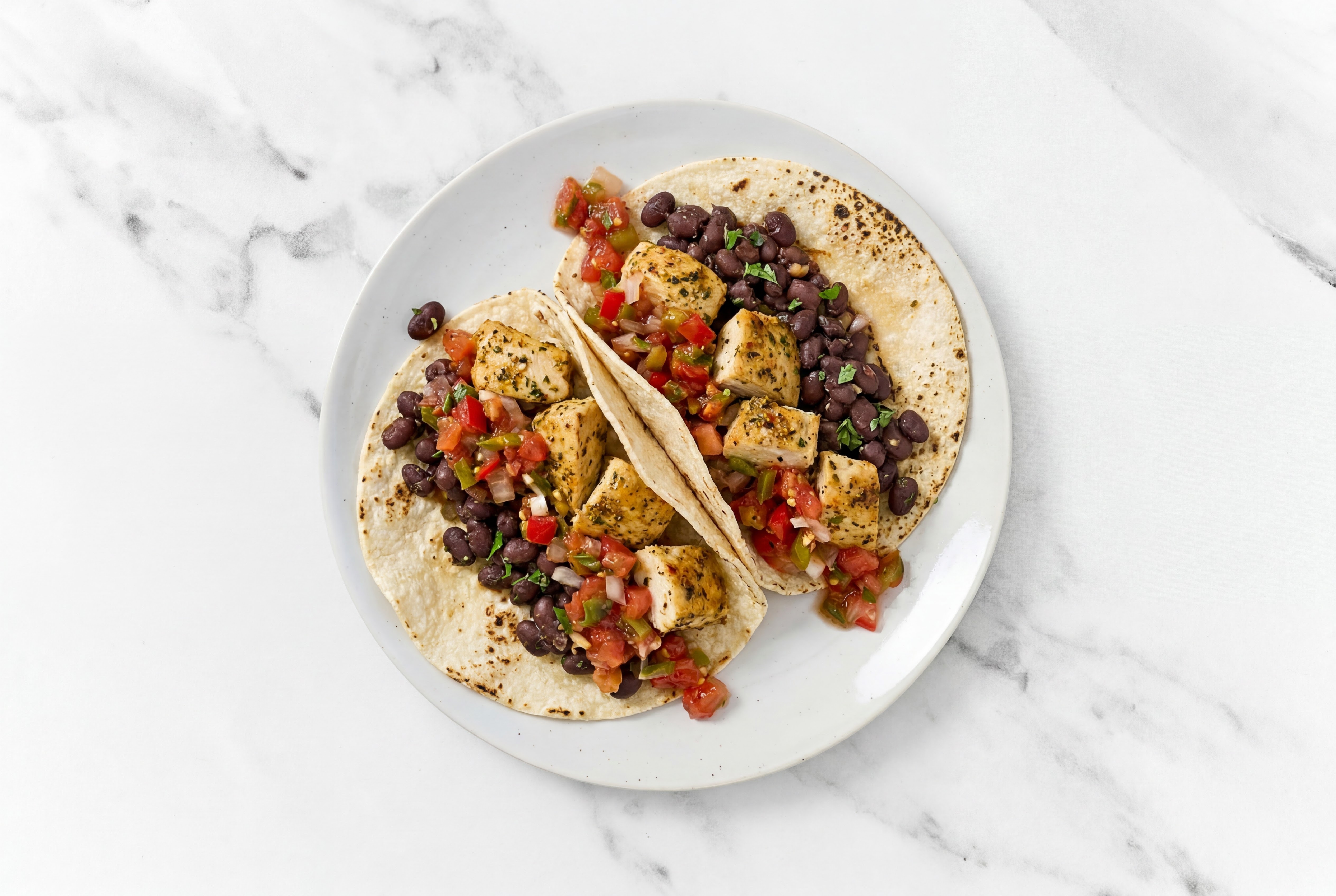 Hearty Garlic Chicken Tacos with Pico De Gallo & Spiced Beans