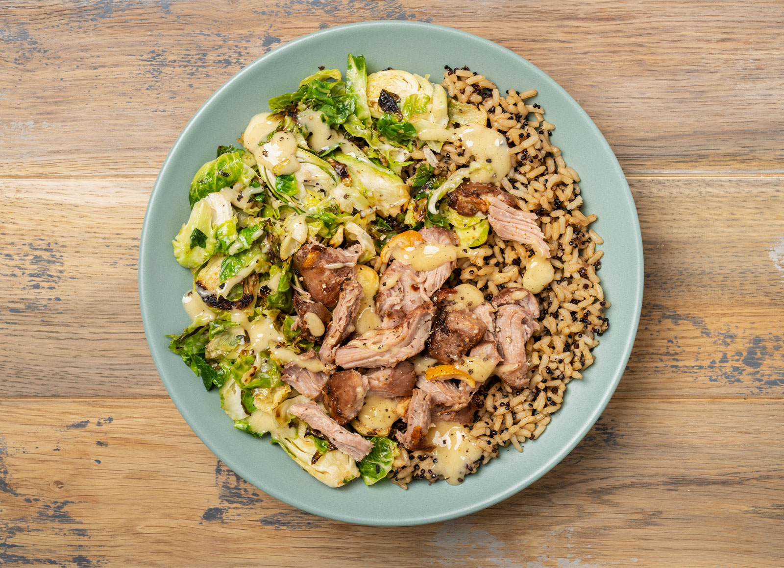 Roasted Carnitas + Brussels Rice Bowl with House Dressing