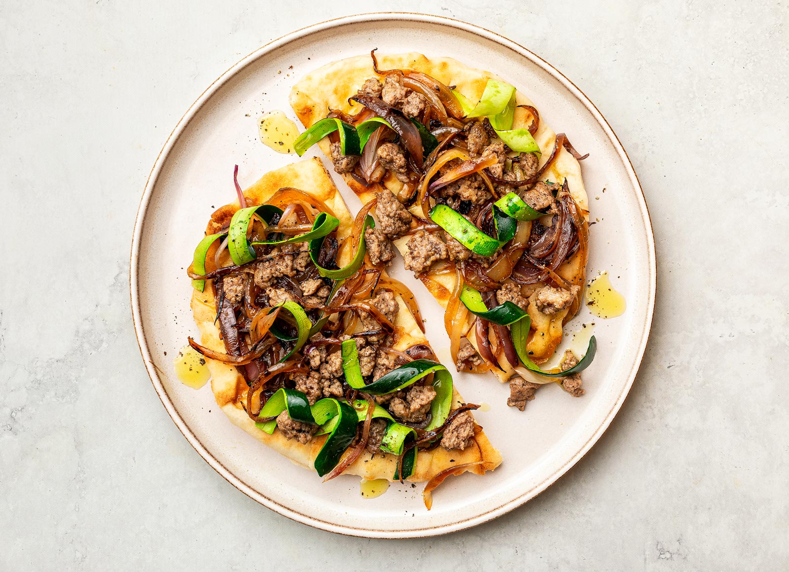 Lamb + Caramelized Onion Naan with Zucchini