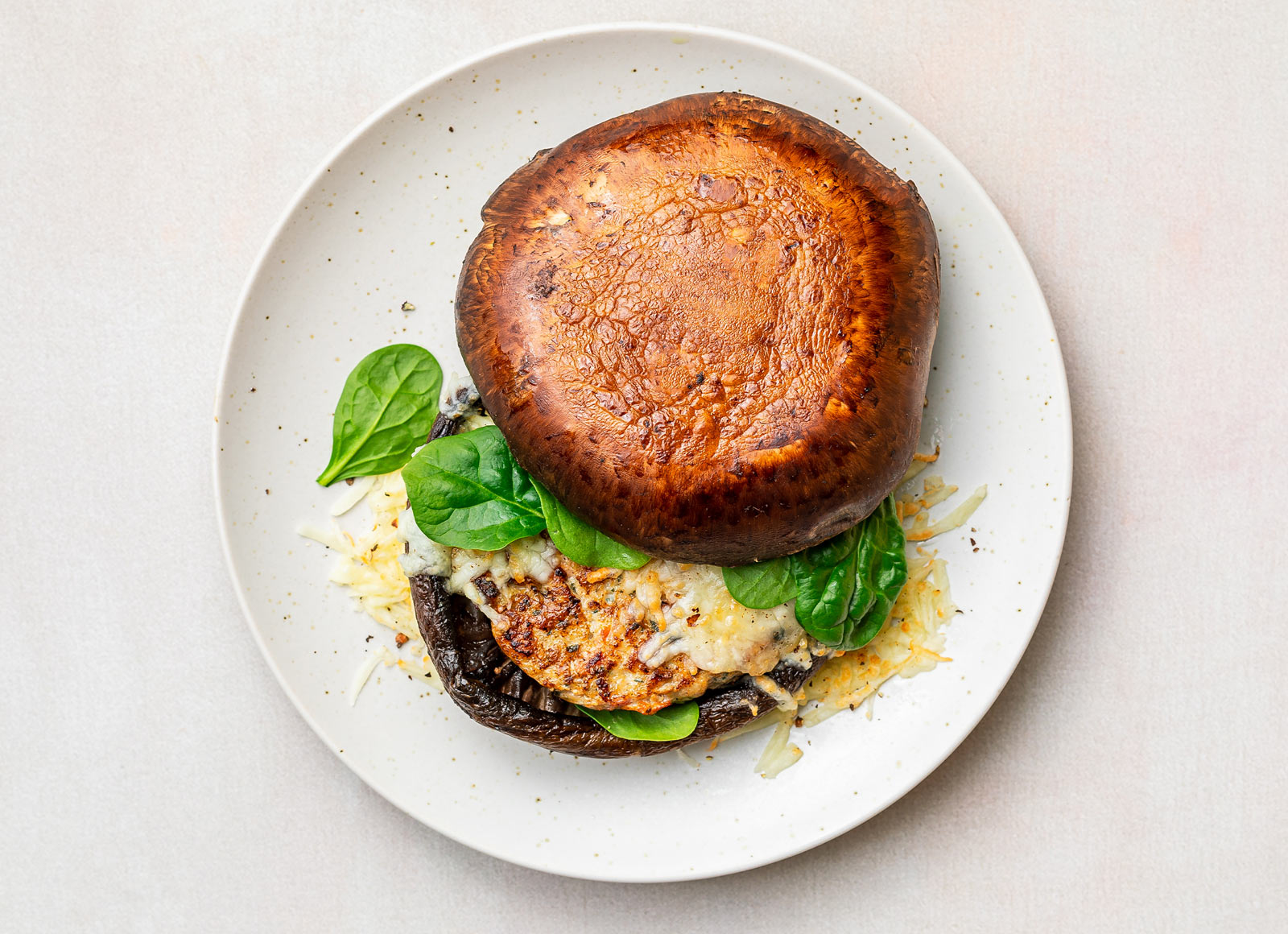 Cheesy Bruschetta Chicken Portabella Bun Burger with Shredded Mozzarella Cheese