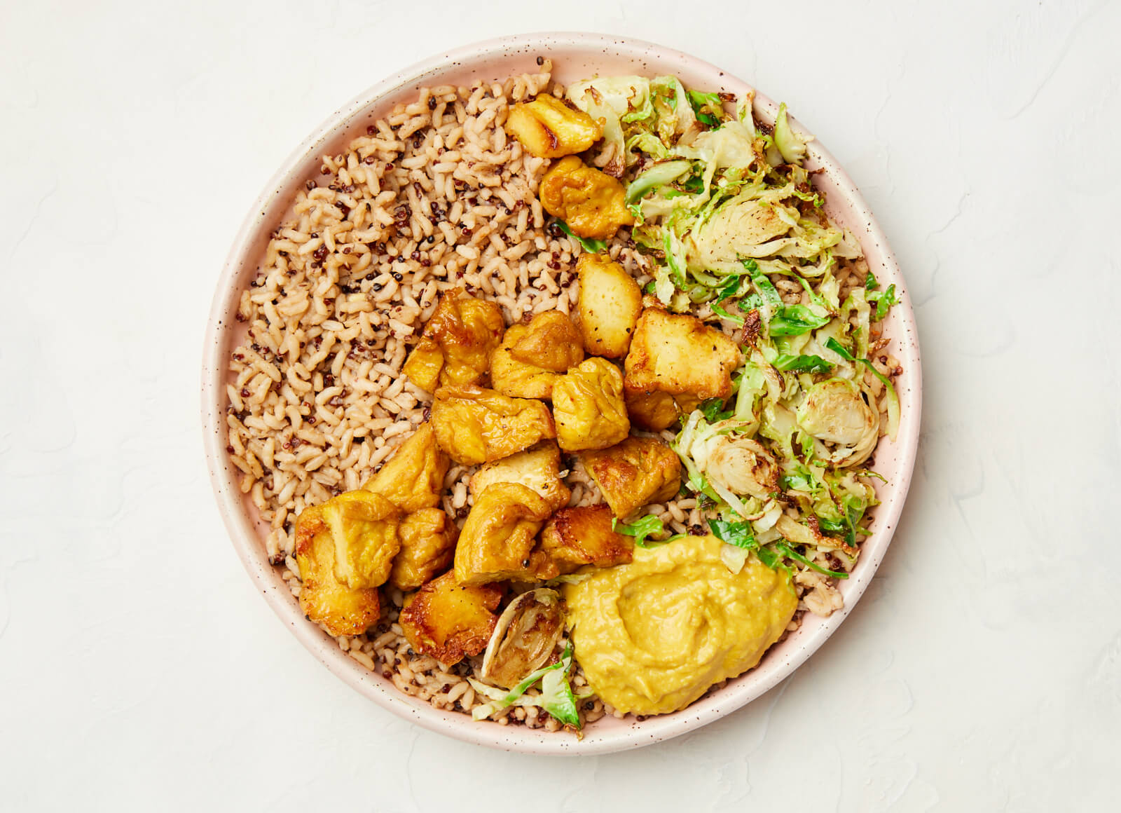 Curry Tofu + Crispy Brussels Brown Rice Bowl