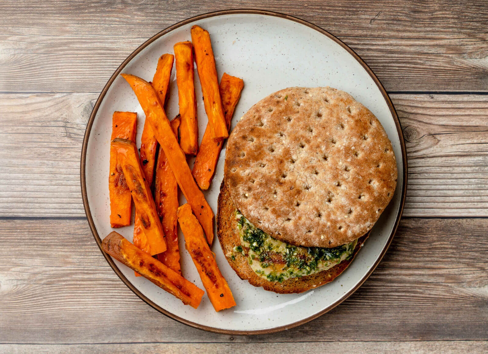 Pesto Seasoned Grilled Chicken Breast Sandwich with Sweet Potato Fries