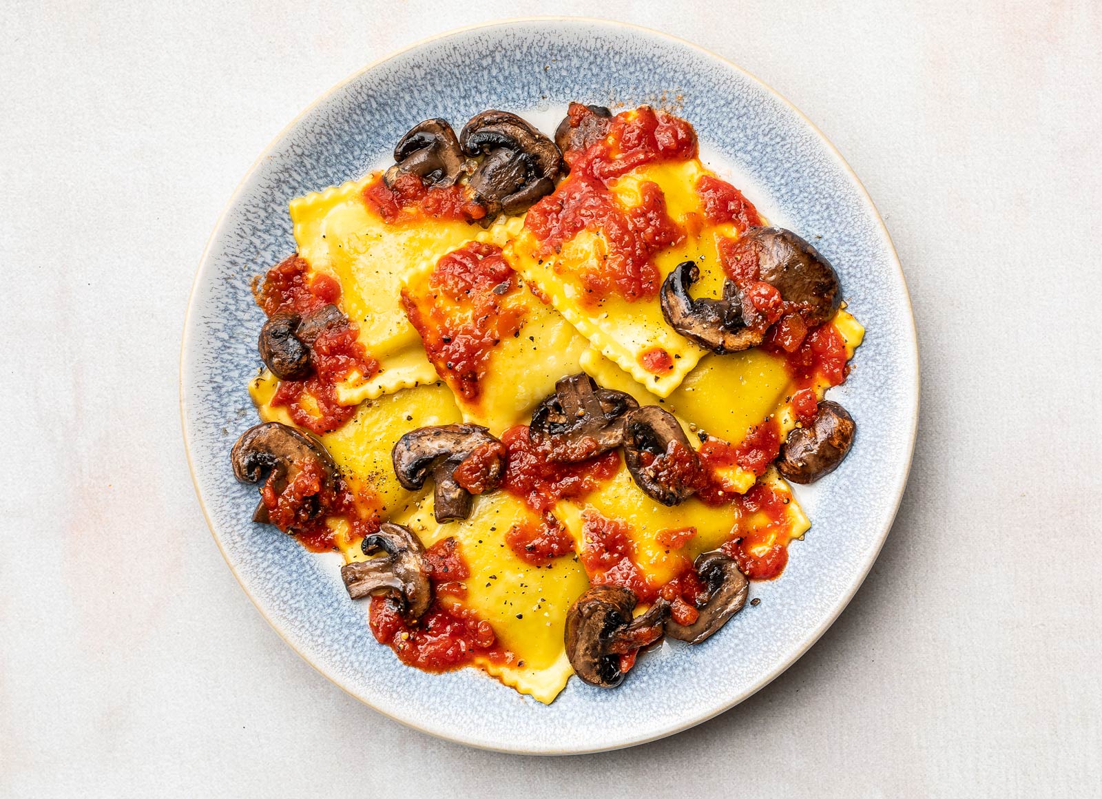 Marinara Ricotta Ravioli with Baby Mushrooms